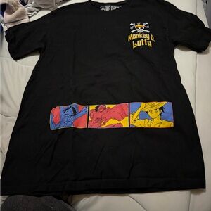 Ripple Junction Black One Piece Graphic Tee with Red and Yellow Accents